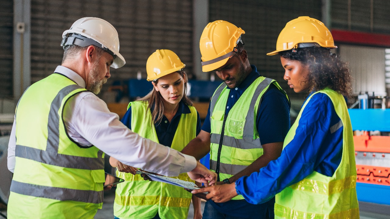 Men handshaking with a logo of the company at the bottom